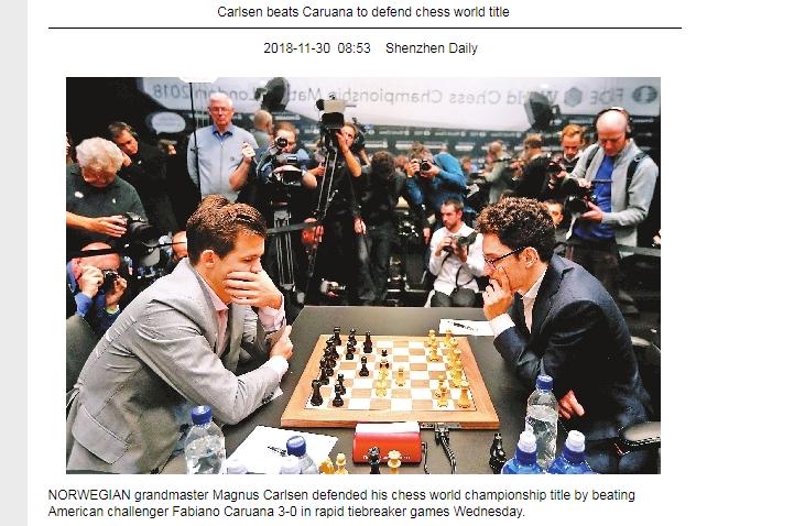 Photo of Carlsen beats Caruana to defend chess world title